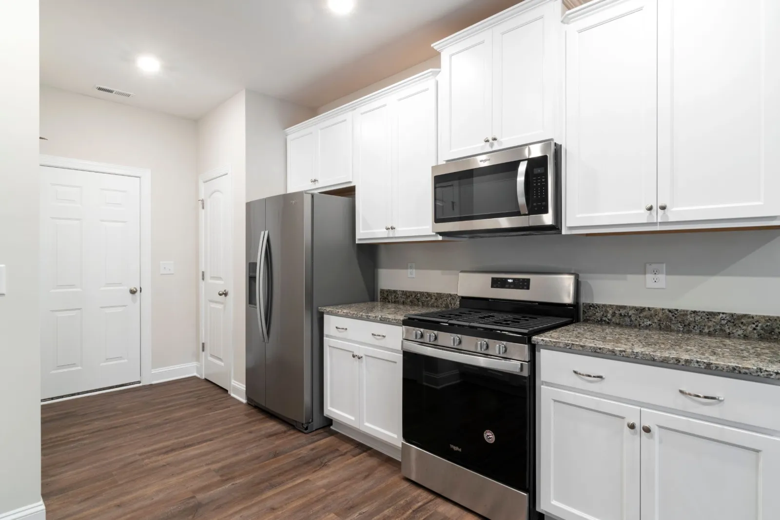 Bright, clean kitchen with stainless steel appliances