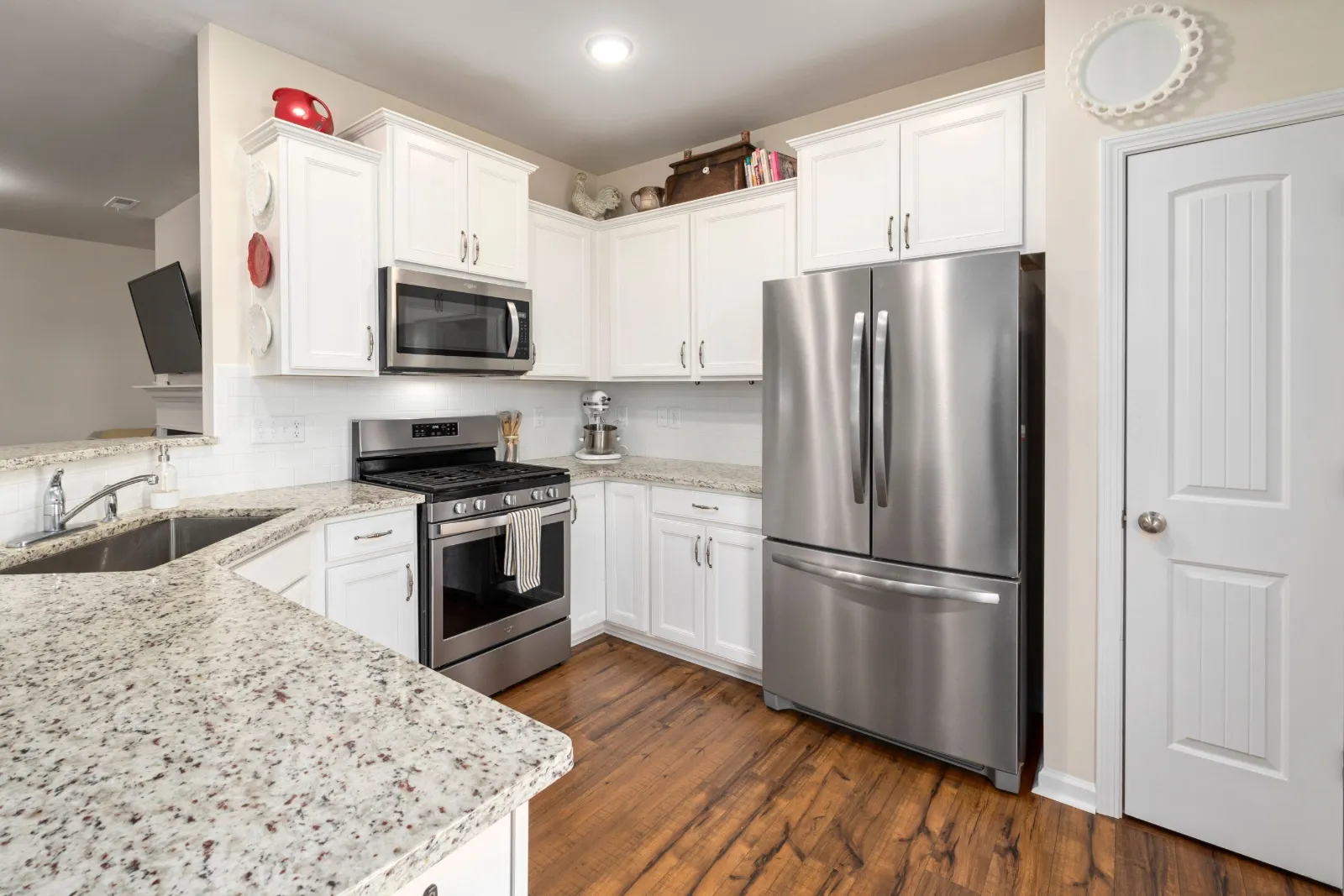 Appliance repair Springfield, VA: kitchen with a French-door refrigerator and gas range